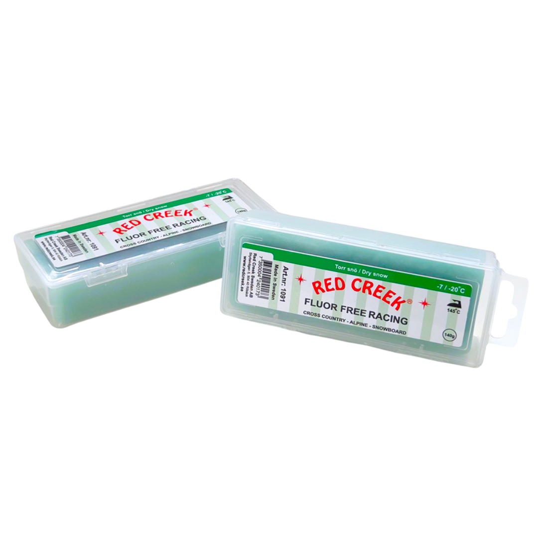 A product picture of the Red Creek Fluor-Free Racing Green Dry Snow Hard Melt Glide Wax