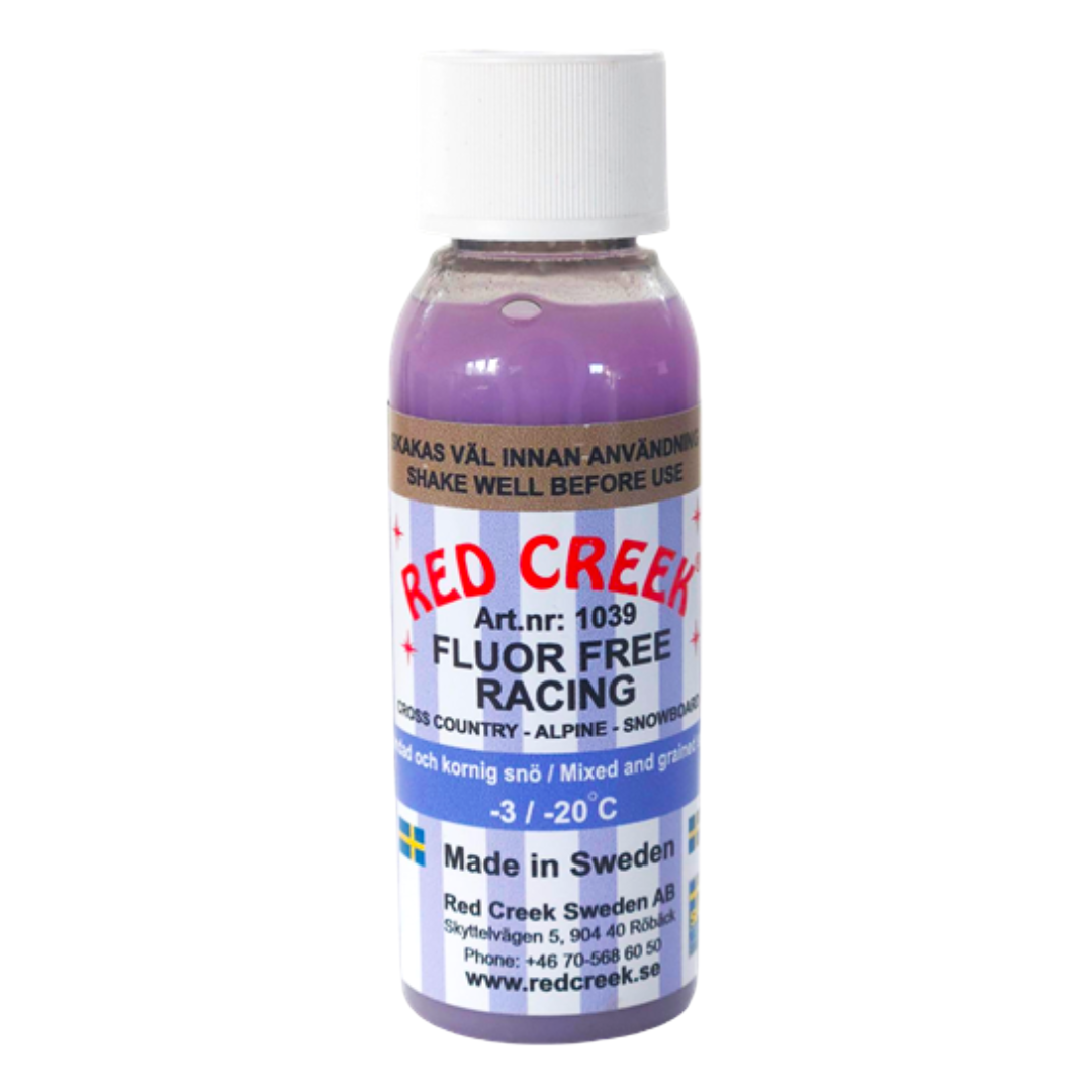 A product picture of the Red Creek Fluoro-Free Racing Indigo Mixed and Grained Snow Liquid Glide Wax