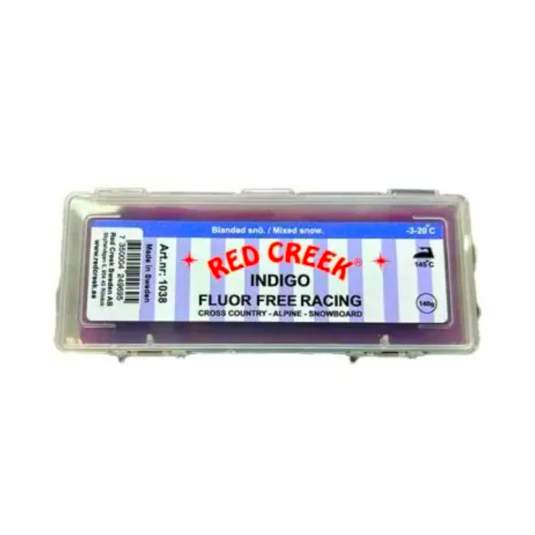 A product picture of the Red Creek Fluoro-Free Indigo Mixed Snow Hard Melt Glide Wax