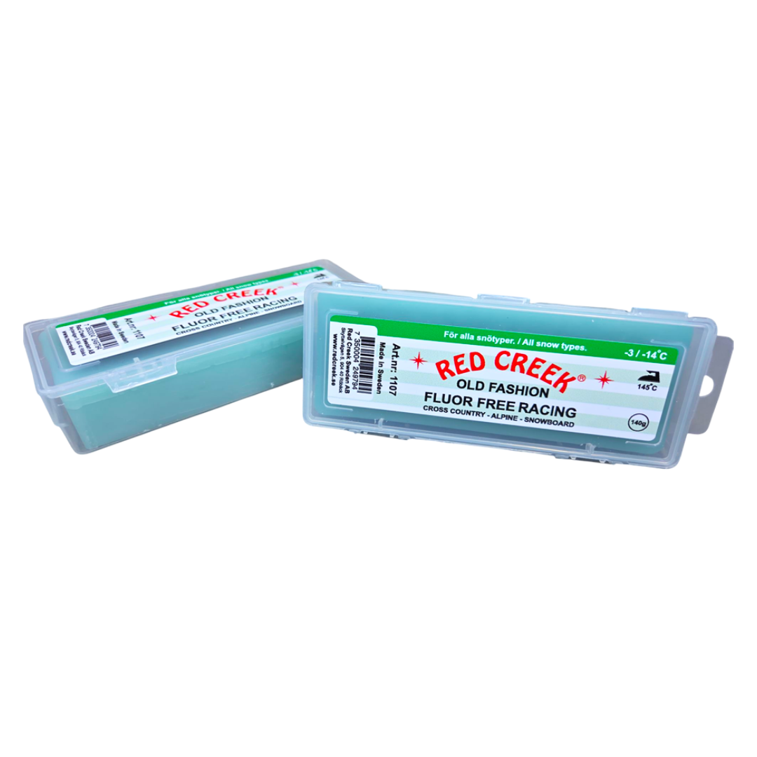 A product picture of the Red Creek Fluor-Free Green `Old Fashion` All Snow Types Melt Glide Wax
