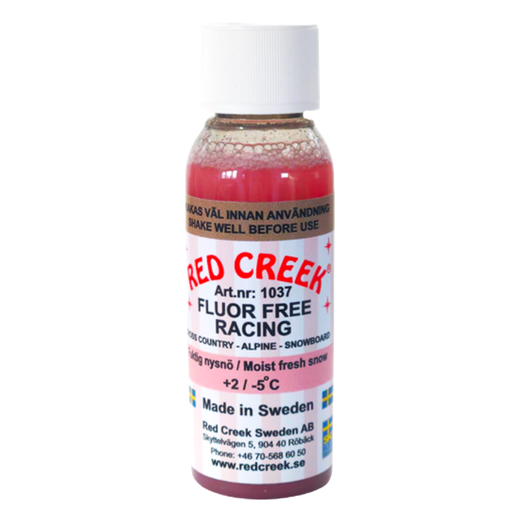A product picture of the Red Creek Fluoro-Free Racing Pink Wet and New Snow Liquid Glide Wax